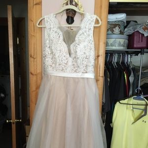 Brand new with tags size 16 wedding dress.